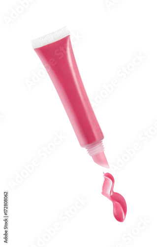 Lip gloss tube and stroke isolated on white 