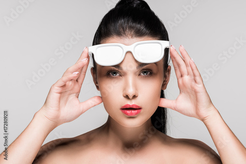 woman in white painted sunglasses