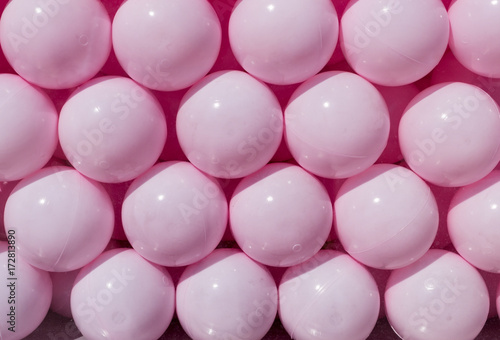 decorative pink plastic balls. background, texture, concept.