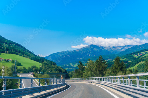 country road at the european alps photo