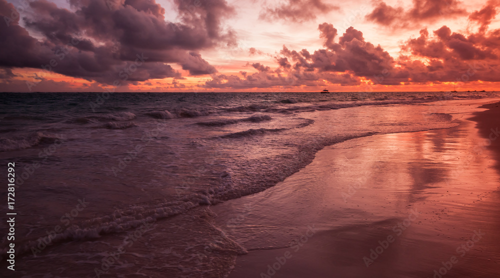 Red sunrise over Atlantic Ocean coast, Bavaro