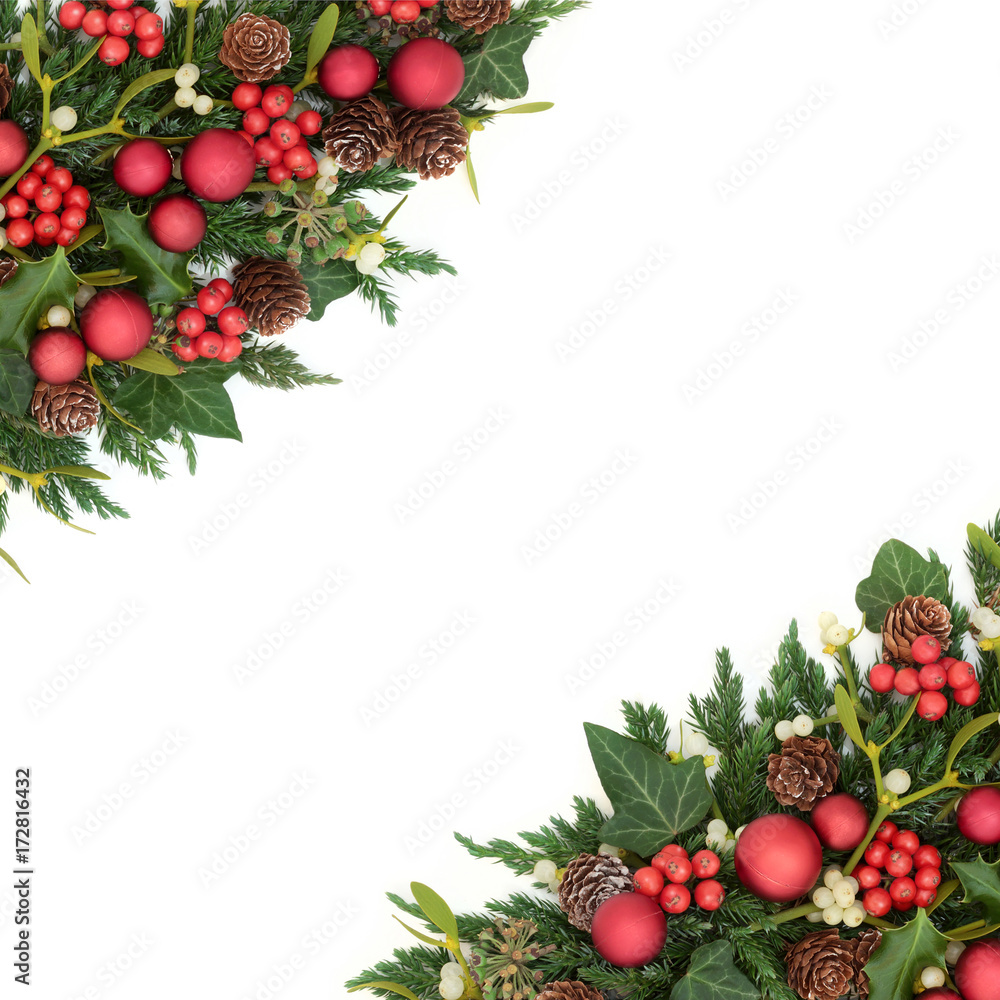 Christmas decorative background border on parchment paper with red bauble  decorations, holly, mistletoe, ivy, fir and pine cones Stock Photo - Alamy