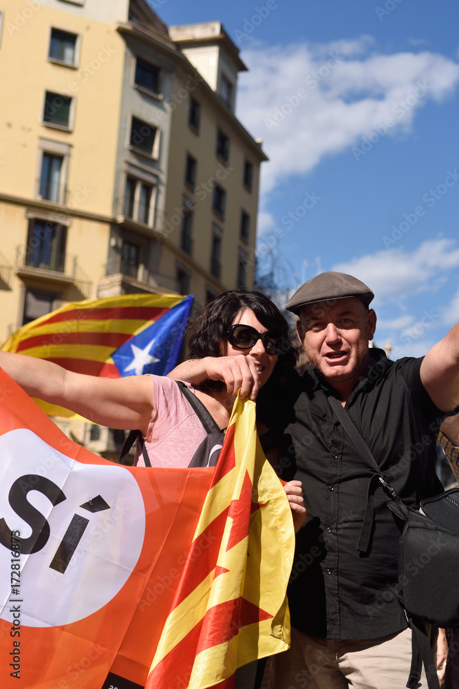 protesters in the manifestation of the (SI) in Barcelona, September 11, 2017