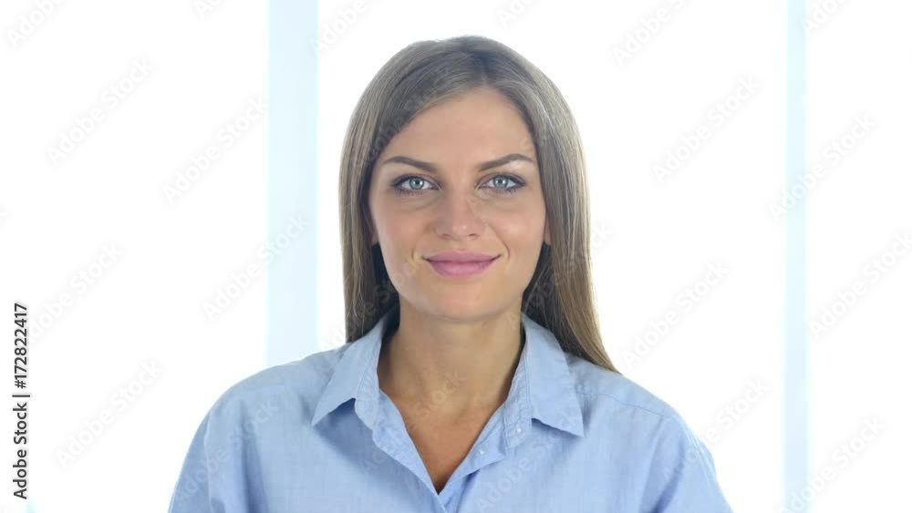 Portrait of Beautiful Young Woman Shaking Head to Accept, Yes Portrait of Beautiful Young Woman Shaking Head to Accept, Yes