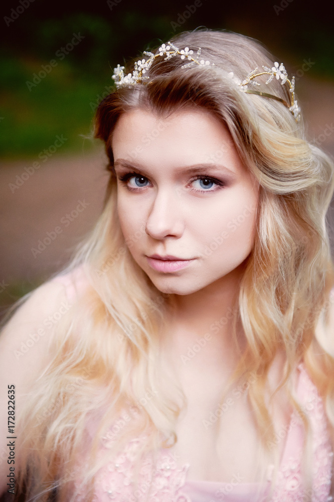 Portrait of beautiful bride blonde in pink lace dress in the hair ornament handmade. Big facial Portrait of beautiful bride blonde in pink lace dress in the hair ornament handmade. Big facial