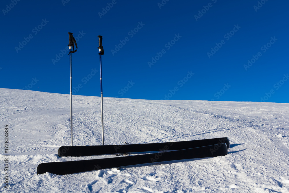 Ski and ski poles on a slope Ski and ski poles on a slope