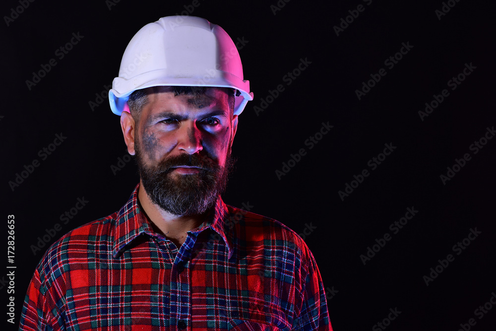 Construction and hard work concept. Man with confident face Construction and hard work concept. Man with confident face