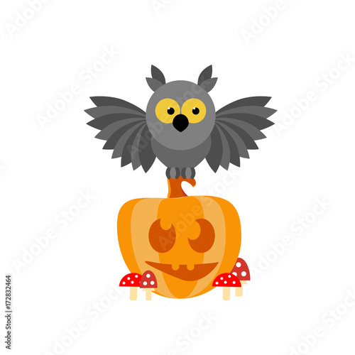 Cartoon owl sitting on a smiling pumpkin in the toadstools. Isolated vector illustration. Halloween.