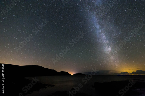 Nairbyl Bay in the south of the Isle of Man light by the milkyway