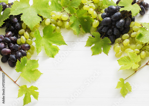 grapes on white wooden table