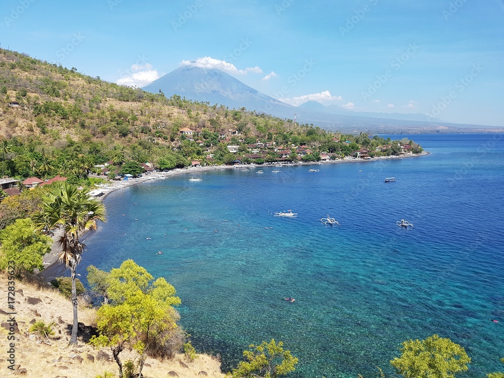 City of Amed with Mount Agung in the background - Bali