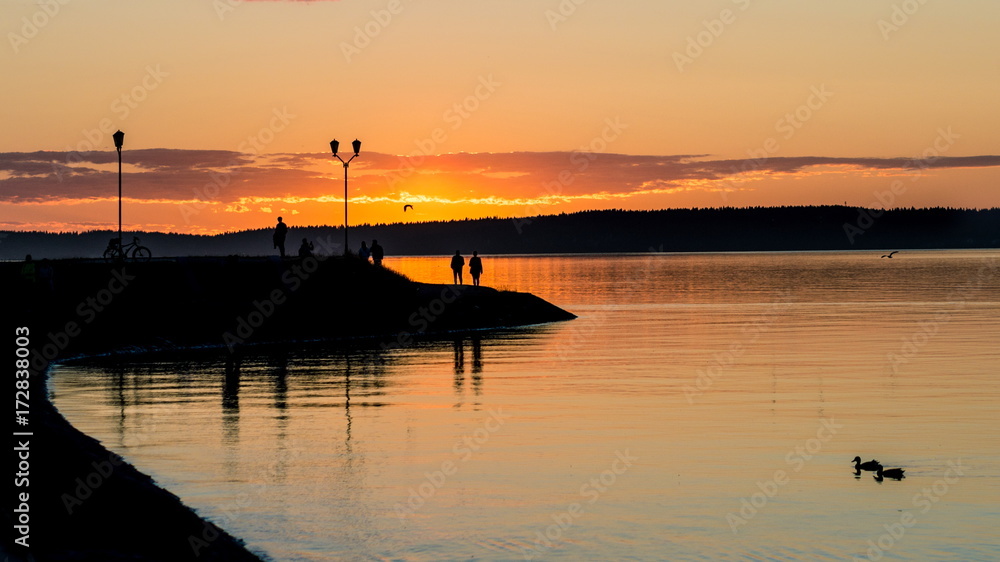 Sunset on the waterfront of Lake Onega. Petrozavodsk. Karelia