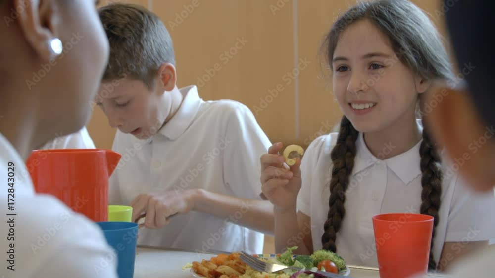 Close Up Of School Pupil Having Lunch In Canteen Shot On R3D Close Up Of School Pupil Having Lunch In Canteen Shot On R3D