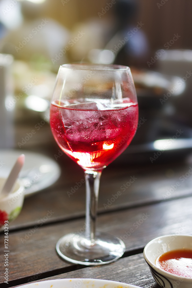 Glass of wine on table at the lunch time Glass of wine on table at the lunch time