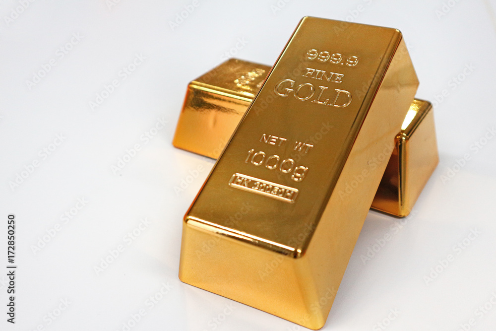 Two golds bar on white background , still life shot. Two golds bar on white background , still life shot.