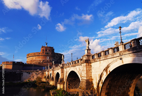 Ponte Sant' Angelo bridge in Rome, Italy with bright blue sky
