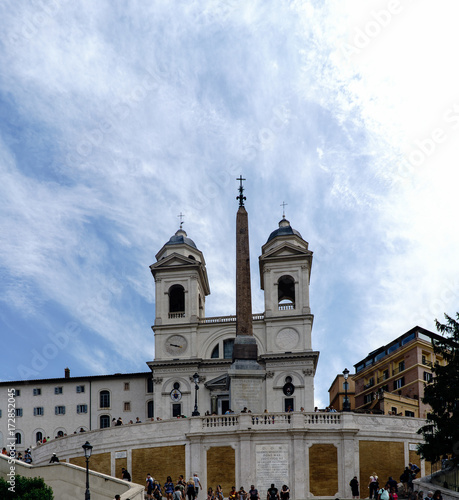 Rome, Lazio, Italy. May 22, 2017: View of the Catholic church called "Trinita dei Monti" and the obelisk called "Salustiano" from the staircase called "Scalinata di Trinità dei Monti". © peizais