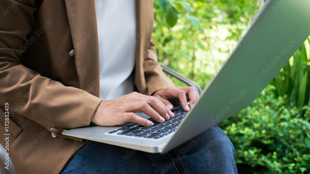 woman creative business using laptop at a outdoor with nature woman creative business using laptop at a outdoor with nature