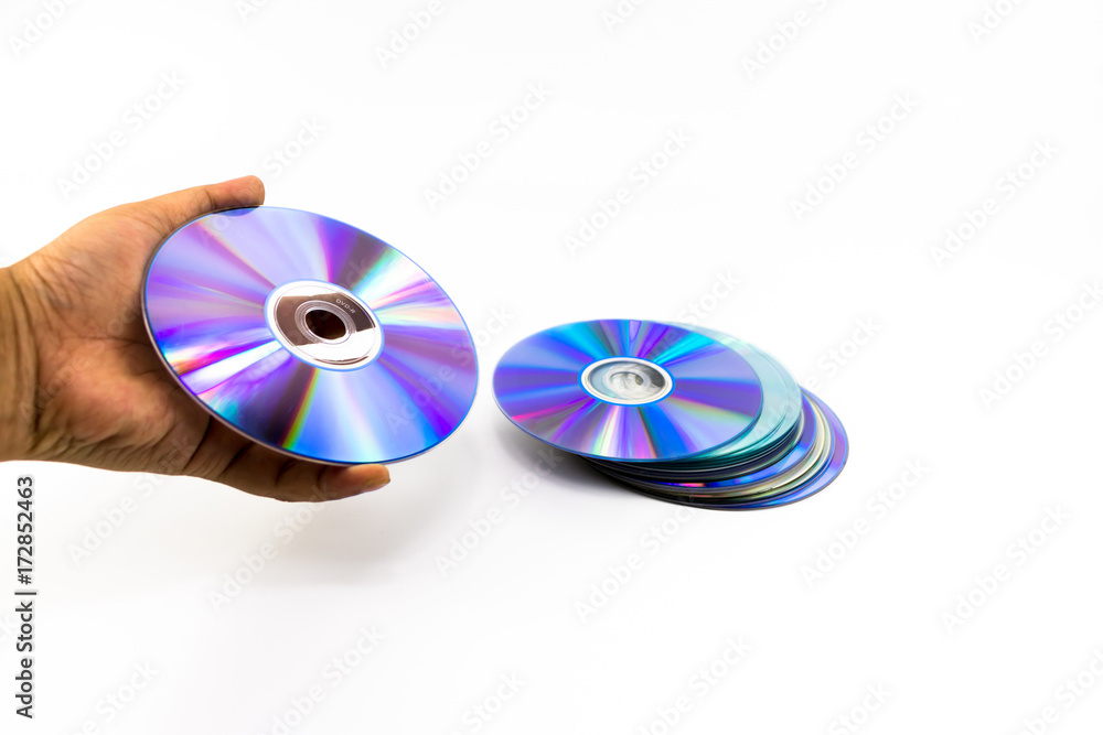 CD-ROM disc with rainbow reflective light on man hand isolated CD-ROM disc with rainbow reflective light on man hand isolated
