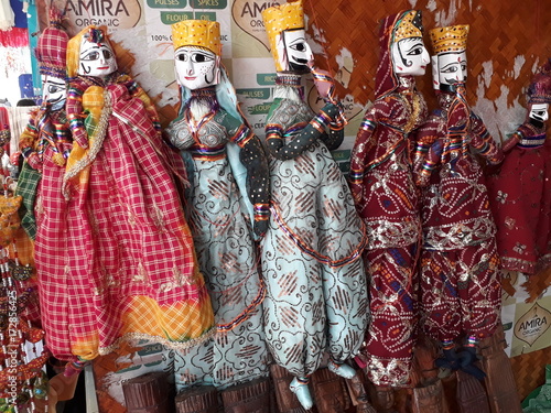 Handmade Rajasthani puppets in a cultural market in North India.