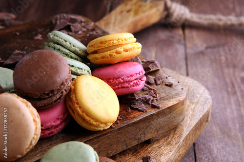 Close up colorful macarons dessert with vintage pastel tones photo