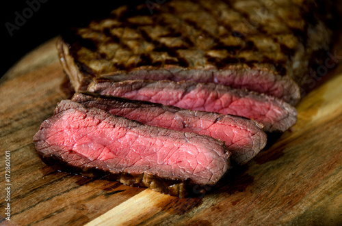 rare steak wooden cutting board
