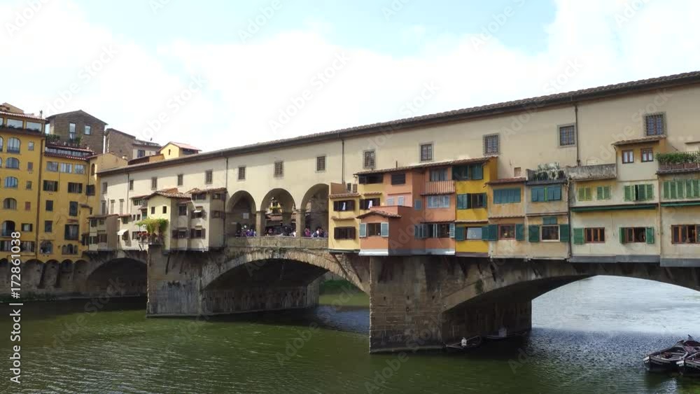 Iconic Vecchio Bridge in Florence over river Arno called Ponte Vecchio - Tuscany Iconic Vecchio Bridge in Florence over river Arno called Ponte Vecchio - Tuscany