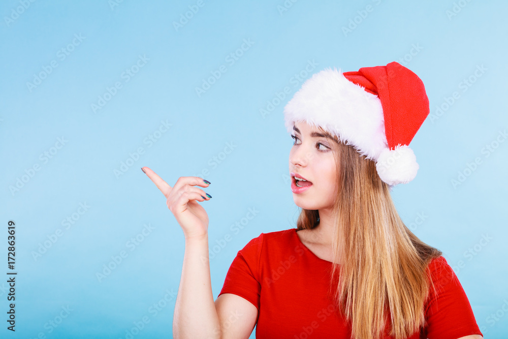 Happy woman wearing Santa Claus helper costume Happy woman wearing Santa Claus helper costume