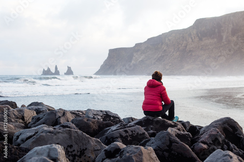 Lonely woman watching the sea photo