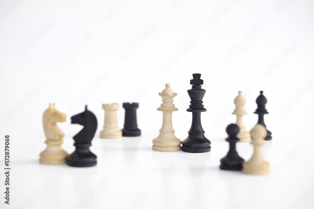 White queen and black king, traditionally confronted in chess game