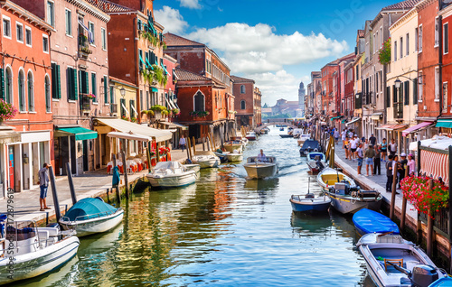 Fotografiet Island murano in Venice Italy. View on canal with boat