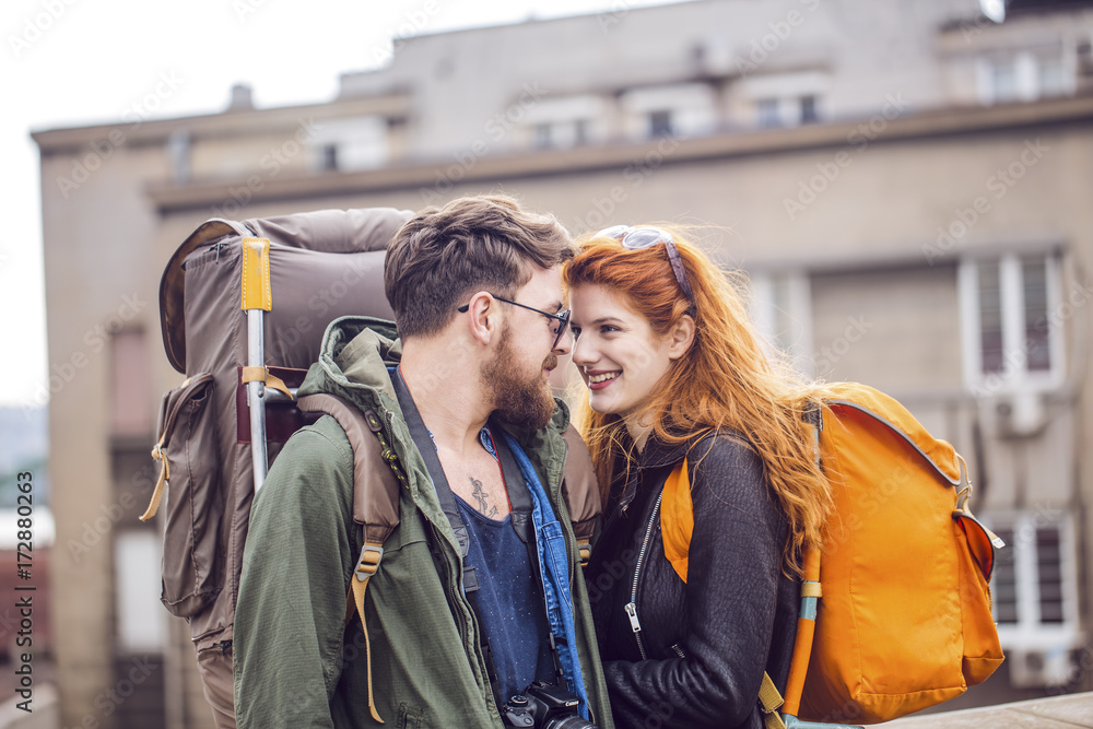 Happy Couple Travelling With a Backpack Happy Couple Travelling With a Backpack