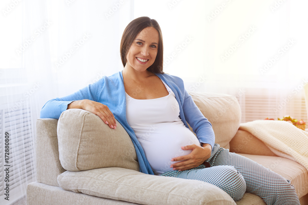 Sentimental pregnant woman at home Sentimental pregnant woman at home