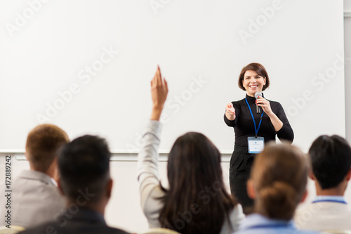 group of people at business conference or lecture