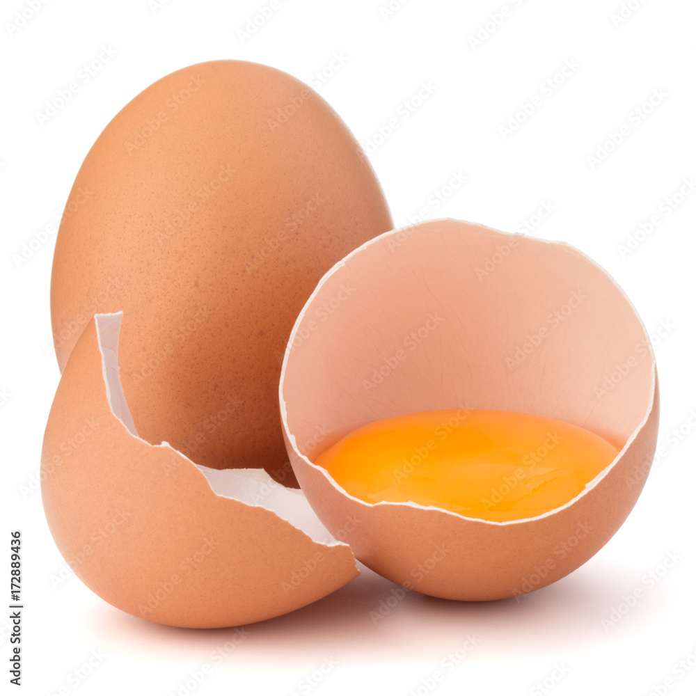 Broken egg in eggshell half and raw egg isolated on white background cutout Broken egg in eggshell half and raw egg isolated on white background cutout