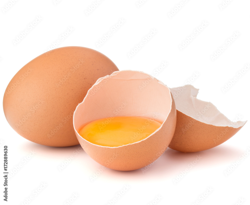 Broken egg in eggshell half and raw egg isolated on white background cutout Broken egg in eggshell half and raw egg isolated on white background cutout