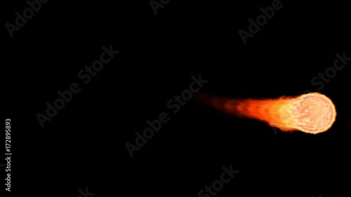 Animated realistic fireball or meteor falling or flying through atmosphere. Black background, mask included. Fire and smoke isolated. photo