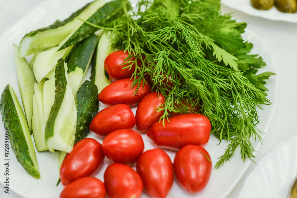 ripe fresh vegetables close-up. tomatoes cucumbers onion ripe fresh vegetables close-up. tomatoes cucumbers onion