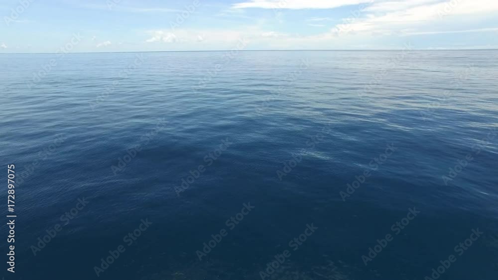 A beautiful drone shot of the ocean's horizon. A beautiful drone shot of the ocean's horizon.