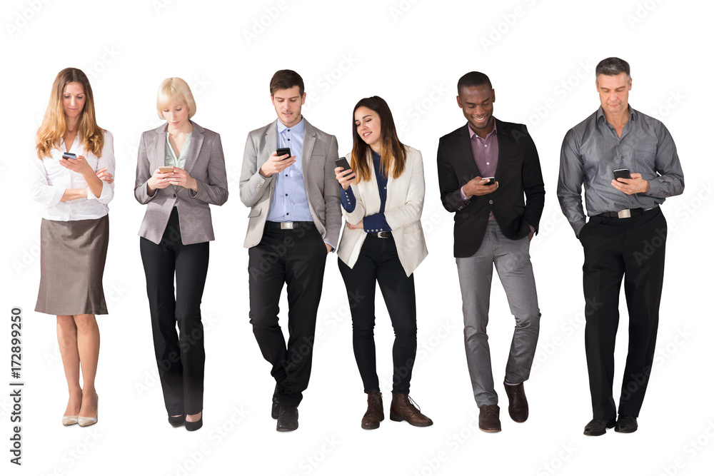 Multi Ethnic Business People Using Cell Phones Multi Ethnic Business People Using Cell Phones