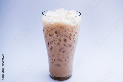 Iced chocolate milk with white background.