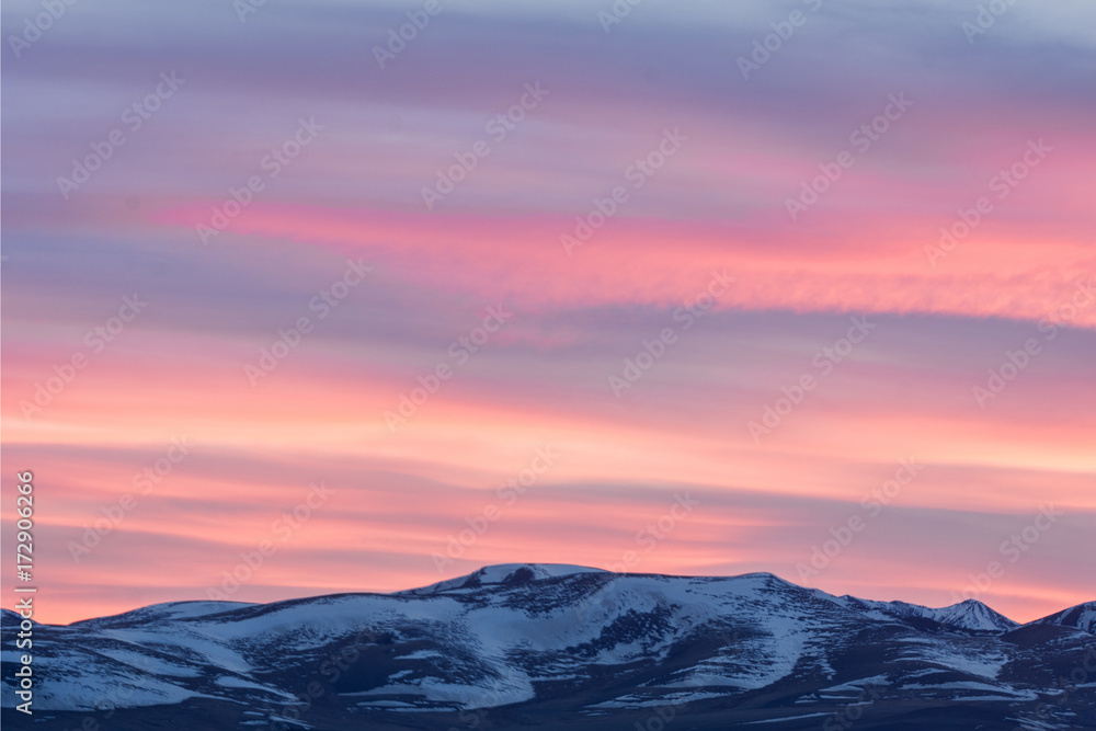 amazing view of plain at root of mountains at fairy pink sunset 