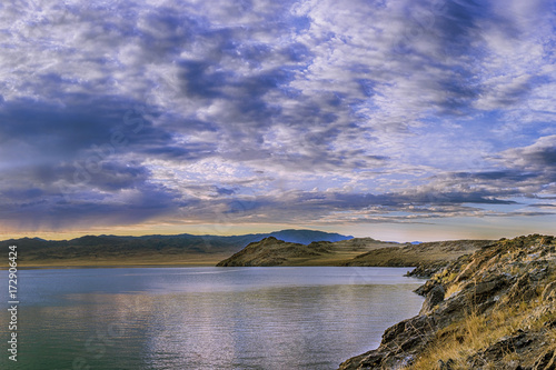 Fototapeta Naklejka Na Ścianę i Meble -  panoramic view of sea surrounded by rocky coast 
