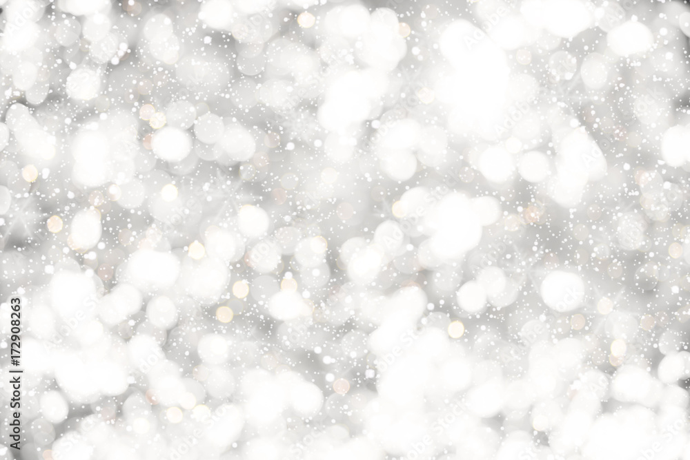 Christmas background - white glitter christmas abstract snow with blur  bokeh light background. Stock Photo