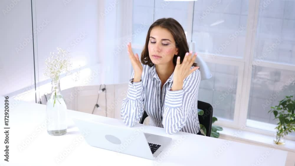 Reaction on  Business Loss on Laptop by Woman at Work