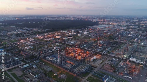 Wallpaper Mural  aerial shot  flying over polluting factory at night Torontodigital.ca