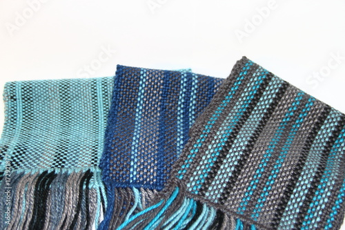 looms, loom fittings, woven scarves, colored yarns white backgrounds photo