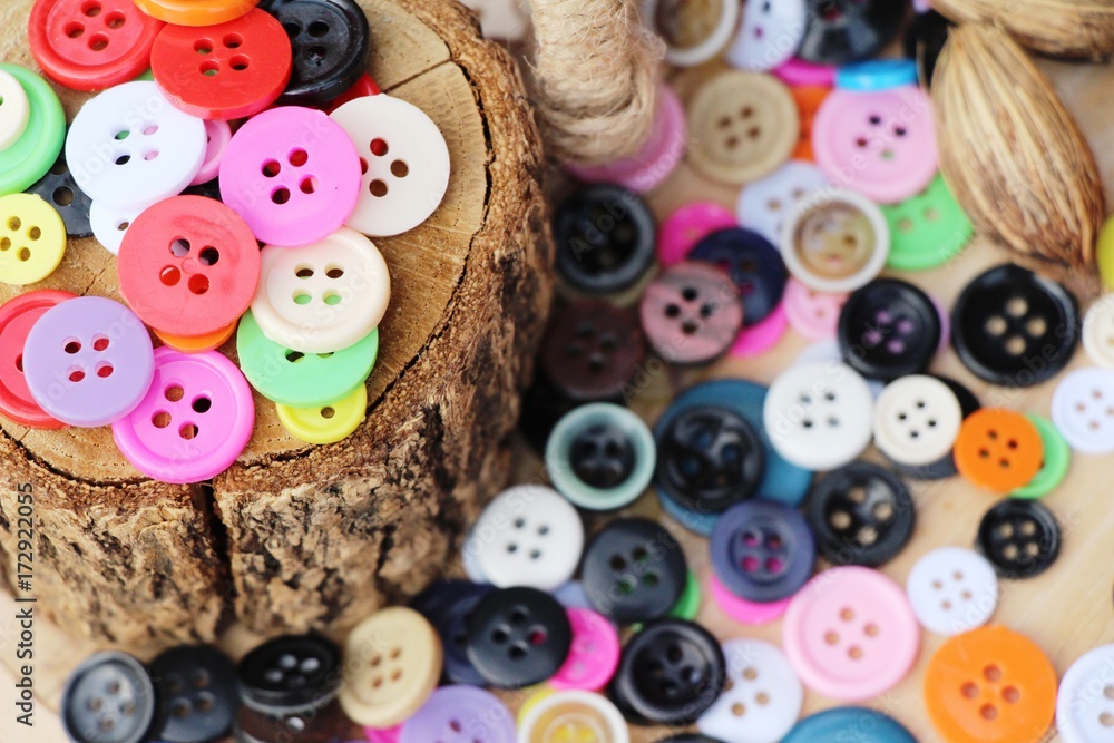 Sewing accessories for sewing on wood background Sewing accessories for sewing on wood background