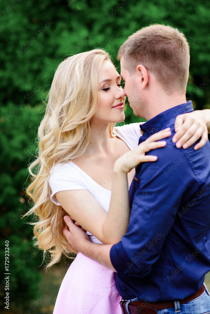guy and girl are hugging in the Park. guy and girl are hugging in the Park.