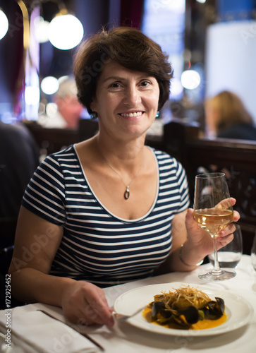 Woman with wine at restaurant